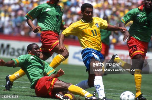 June 1994, FIFA World Cup, Palo Alto, Brazil v Cameroon: Romario of Brazil, surrounded by Cameroon players , scores the opening goal.