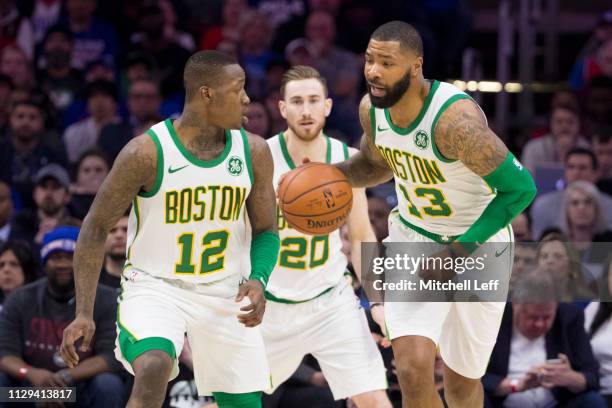 Terry Rozier, Gordon Hayward, and Marcus Morris of the Boston Celtics in action against the Philadelphia 76ers at the Wells Fargo Center on February...