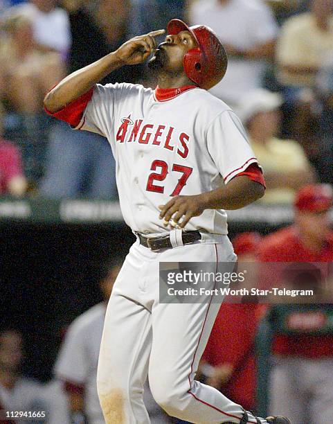 Los Angeles Angles' Vladamir Guerrero expresses his gratitude after hitting a three-run home run in the fourth inning against the Texas Rangers at...