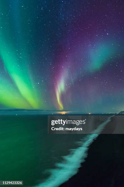 northern lights, iceland - etereo stock-fotos und bilder