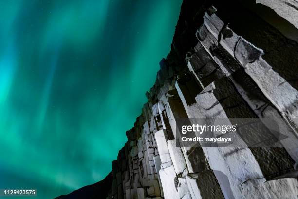 northern lights, iceland - evento catastrofico stock-fotos und bilder