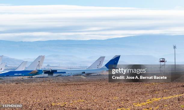 planes parked in an airport, teruel. spain. - teruel stock-fotos und bilder