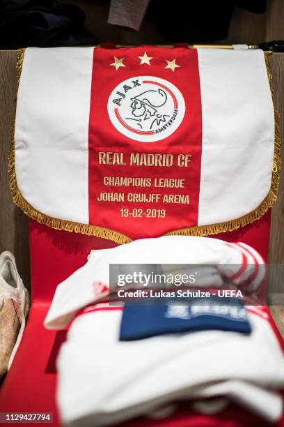 General view inside the dressing room of Ajax Amsterdam with the pennant of Amsterdam prior to the UEFA Champions League Round of 16 First Leg match...