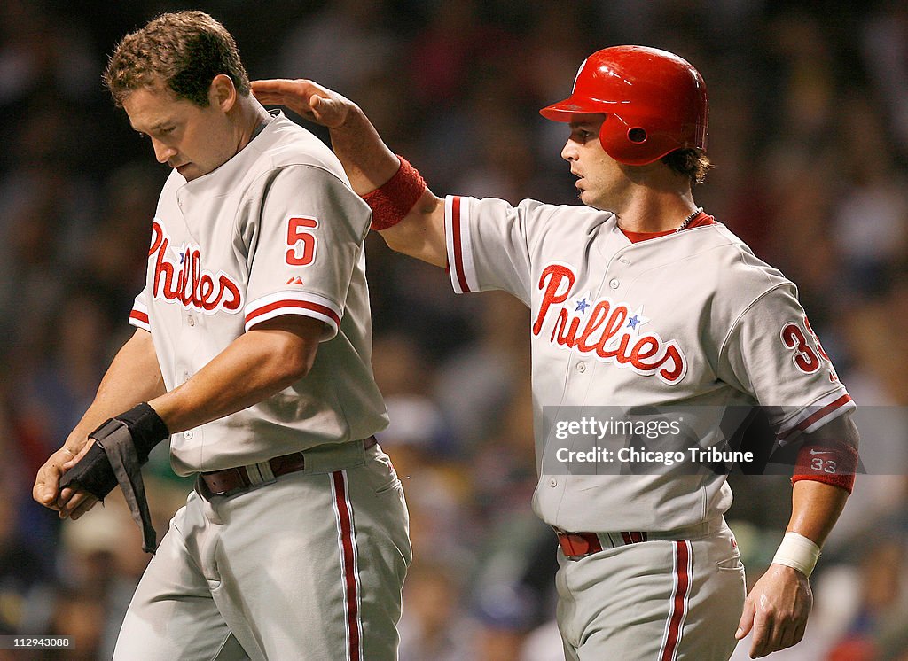 Philadelphia Phillies' Aaron Rowand, right, celebrates with Pat News  Photo - Getty Images