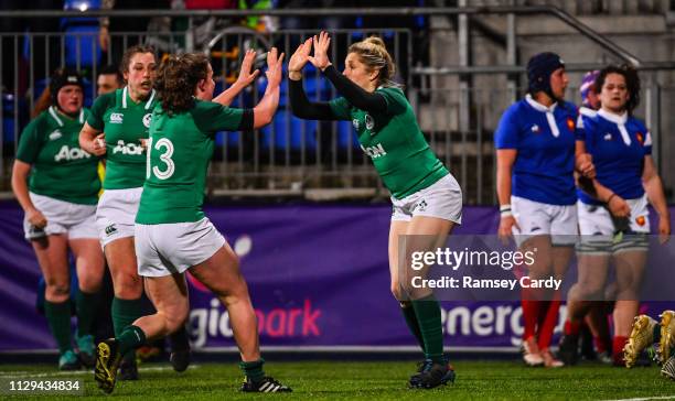 Dublin , Ireland - 9 March 2019; Alison Miller of Ireland celebrates her side's first try with Enya Breen, left, during the Women's Six Nations Rugby...