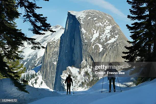 Cross country skiers have a spectacular view of Half Dome as they near their distination at Glacier Point in Yosemite.
