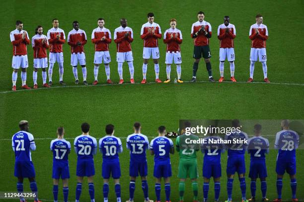 The Stoke City and Wigan Athletic players observe a minutes applause in the memory of Gordon Banks ahead of kick off during the Sky Bet Championship...