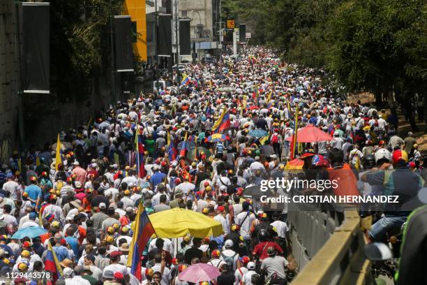 Aerial view of supporters of Venezuelan opposition leader and self-proclaimed acting president Juan Guaido during a demonstration in Caracas on March...