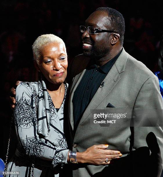 Former Baltimore Bullet Earl "The Pearl" Monroe with wife Marita Green addresses the crowd during a ceremony to retire his jersey during half-time of...