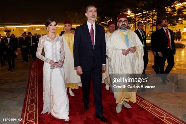 King Felipe VI of Spain , King Mohammed VI of Morocco and s attend a Gala dinner at the Royal Palace on February 13, 2019 in Rabat, Morocco. The...