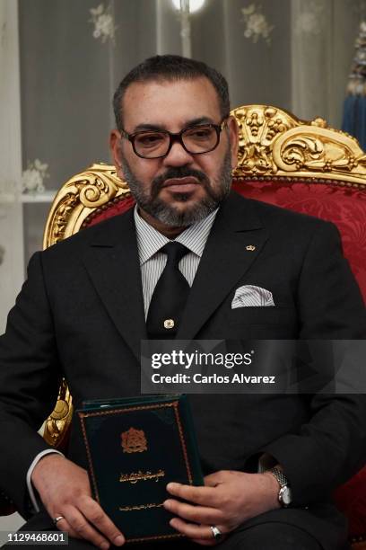 King Mohammed VI of Morocco attends the signing of bilateral agreements at the Agdal Royal Palace on February 13, 2019 in Rabat, Morocco. The Spanish...