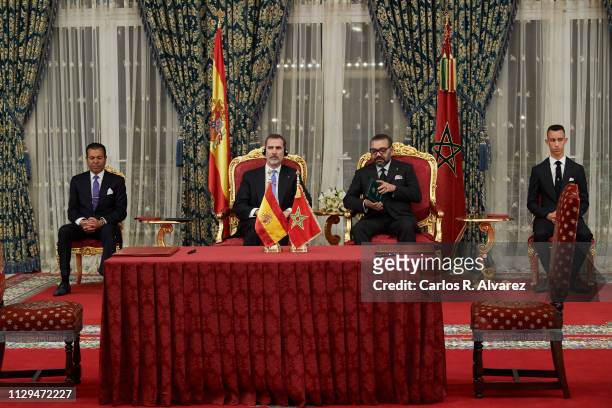 Prince Moulay Rachid of Morocco, King Felipe VI of Spain, King King Mohammed VI of Morocco and Prince Moulay Hassan of Morocco attends the signing of...