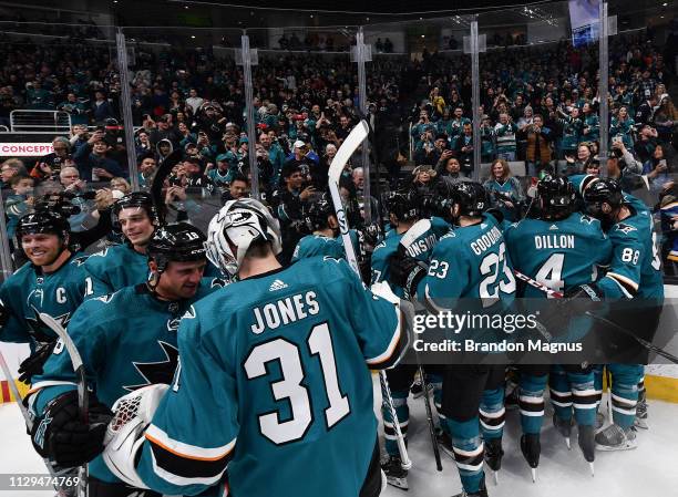 The San Jose Sharks celebrate their overtime win against the St Louis Blues at SAP Center on March 9, 2019 in San Jose, California
