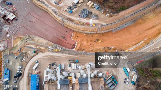 large construction site - aerial view - backhoe overhead stock pictures, royalty-free photos & images