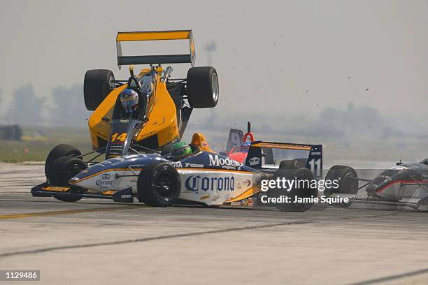 Alex Figge begins to fly after making contact with Roger Yasukawa during the Toyota Formula Atlantic race at the Marconi Grand Prix of Cleveland...