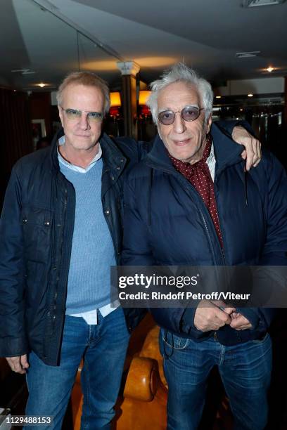 Actors Christophe Lambert and Gerard Darmon attend Claude Lelouch receives the Insignia of Officer of the Legion of Honor at "Club 13" on February...