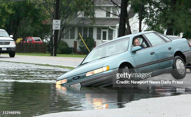 Poquoson, Virginia man took a corner to fast and was stuck in a ditch, Friday, September 1, 2006.