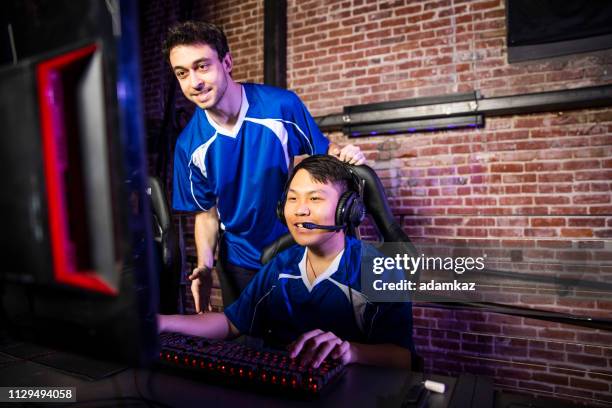 esports team with coach - esports stock pictures, royalty-free photos & images