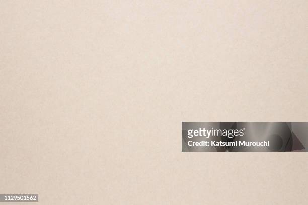 paper texture background - beige fotografías e imágenes de stock