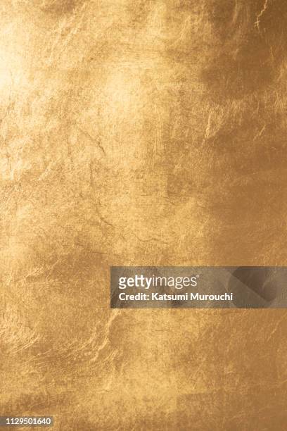 gold wall texture background - foil ストックフォトと画像