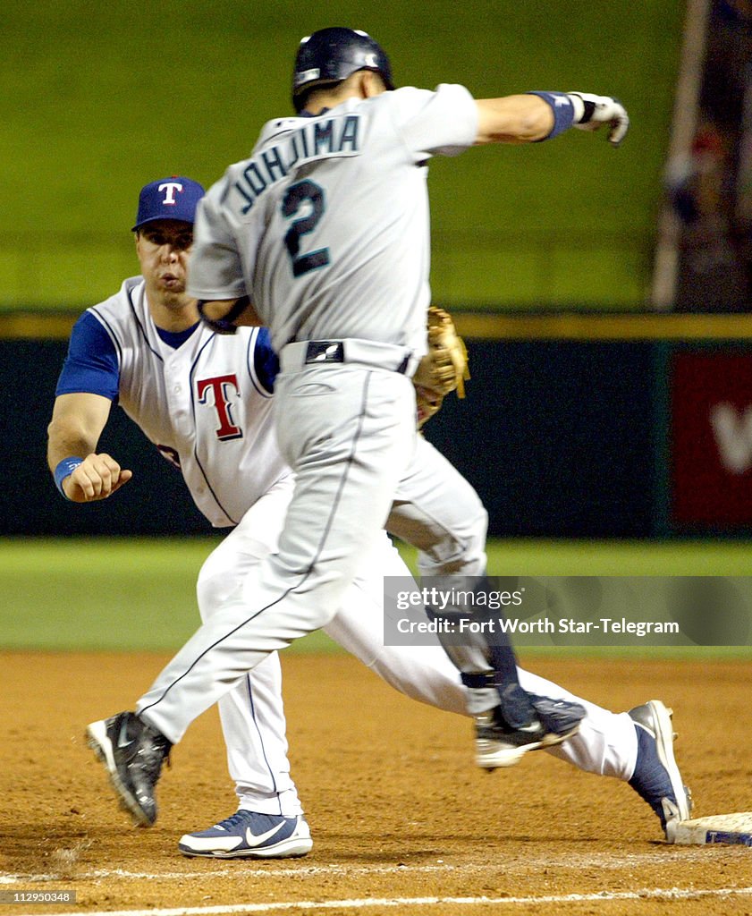 Mark Ranger Seattle Texas Rangers first baseman Mark Teixeira tags out Seattle Mariners ...