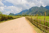Road and cottage in Vang Vieng, Loas
