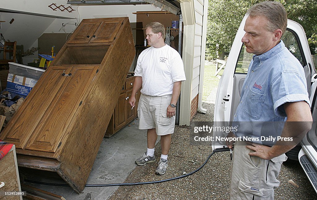 Dwayne Ward Aaron Tragle and Dwayne Ward, a supervisor for Peerless, look over ...