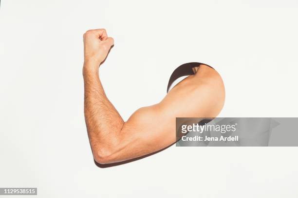 man flexing muscle, determination, strength, fitness, muscle, bicep, confidence, masculinity, muscle man - bíceps fotografías e imágenes de stock