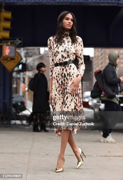 Cindy Bruna is seen wearing a Boss animal print dress outside the Boss show during New York Fashion Week: Fall/Winter 2019 on February 13, 2019 in...