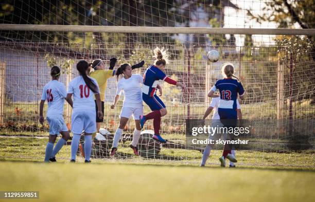 goal at women's soccer match! - shooting at goal stock pictures, royalty-free photos & images