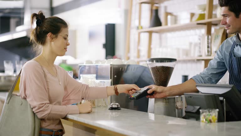 https://media.gettyimages.com/id/1129566832/video/just-a-simple-tap-completes-the-transaction.jpg?b=1&s=640x640&k=20&c=d_YgJvlaIM9azU9e1i4pc3fNm8KG4PvmGu0V1J_gRvc=