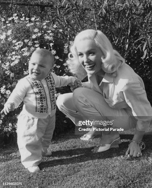 American actress, model and singer Mamie Van Doren, with, Perry, her 11 month-old son by her husband, bandleader Ray Anthony, at their home in Los...