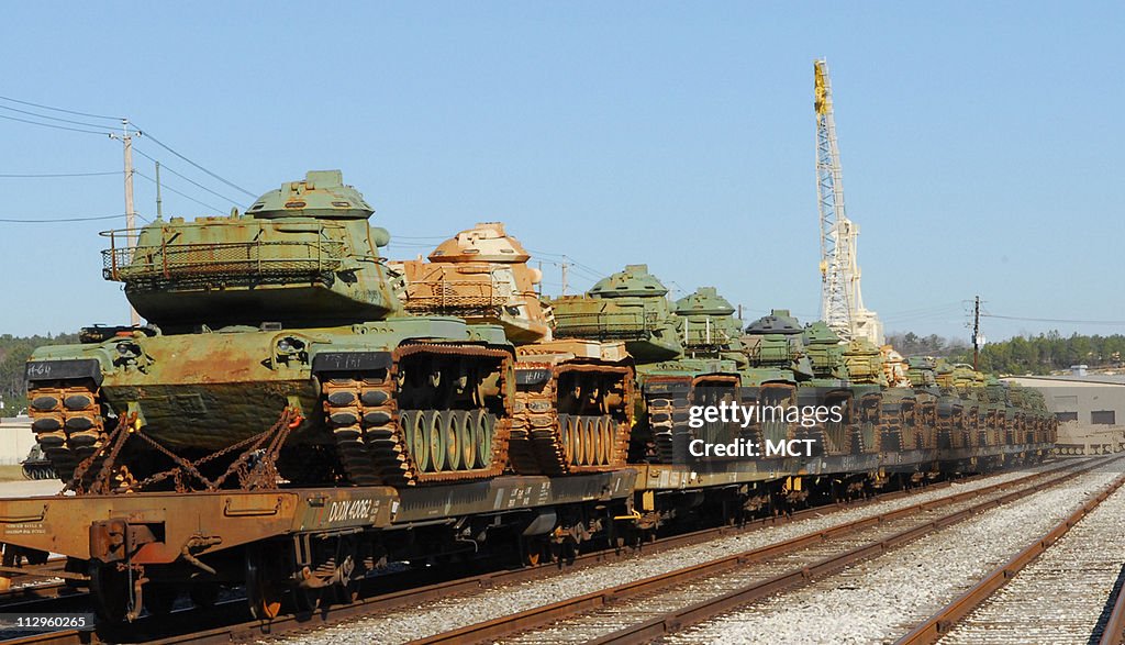 U.S. military tanks sit on rail cars Tuesday, December 5, 20