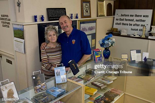 Helen, left, and Rocky Hulse stands inside the Nauvoo Christian Visitors Center that they operate, March 30 in Nauvoo, Illinois. Ex-Mormon Rocky and...