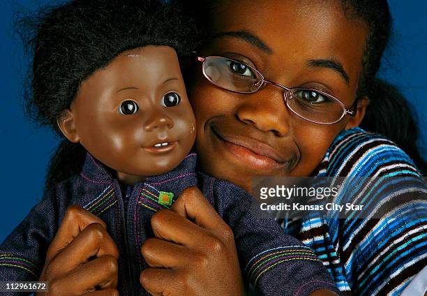 Micah Welch, a fourth-grader from Kansas City, Missouri, pictured April 23 has cherished her American Girl doll, Addy, for the past four years. The...