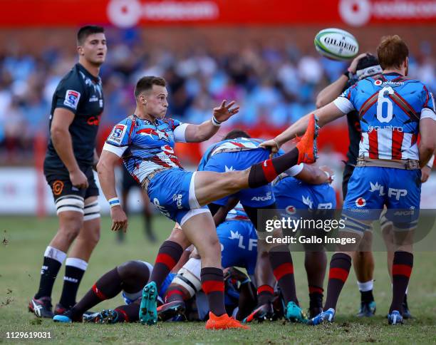 Ivan van Zyl of the Vodacom Bulls clears the base during the Super Rugby match between Vodacom Blue Bulls and Cell C Sharks at Loftus Versfeld on...