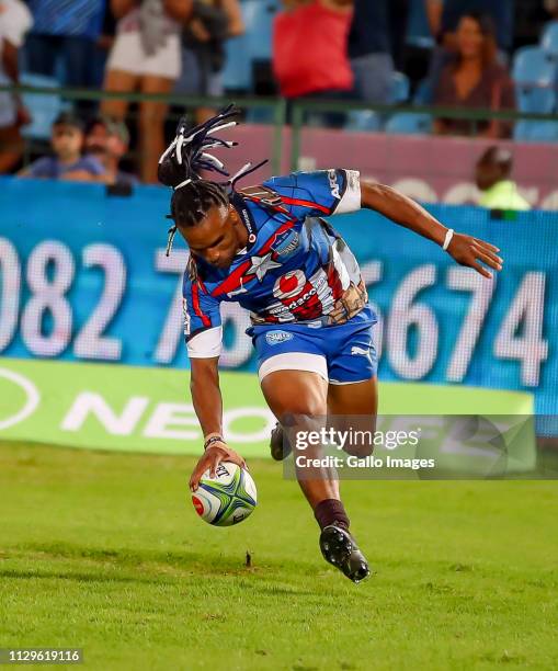 Rosko Specman of the Vodacom Bulls scores during the Super Rugby match between Vodacom Blue Bulls and Cell C Sharks at Loftus Versfeld on March 09,...