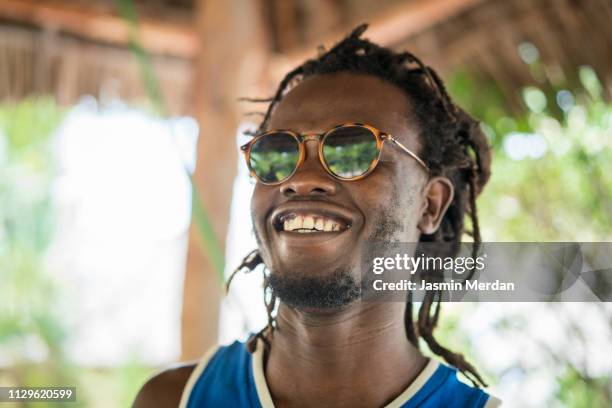 african cool man with sunglasses - jamaica stock-fotos und bilder