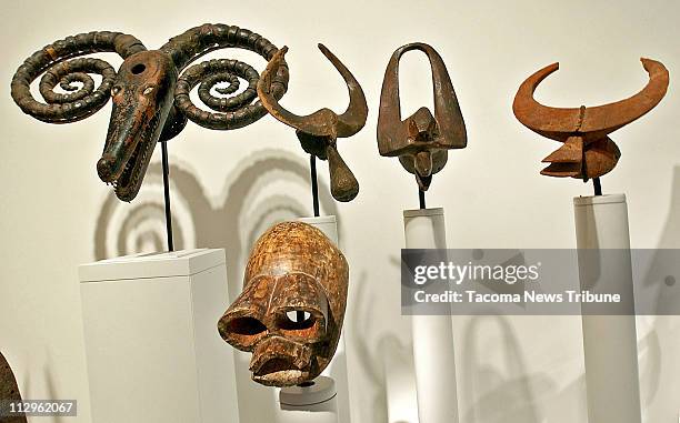 African masks can be seen at the newly expanded Seattle Art Museum in Seattle, Washington, April 12, 2007.