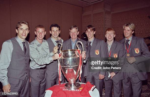 Phil Neville,Nicky Butt,Ryan Giggs, Eric Harrison,Manchester United Youth Team Coach,Gary Neville, Paul Scholes,David Beckham pose with the Champions...