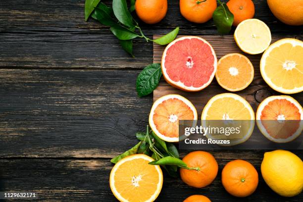 top view of sliced citrus fruits - lemon lime top stock pictures, royalty-free photos & images