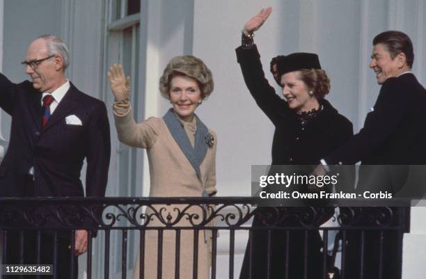 Margaret Thatcher with her husband Denis accompanied by Ronald Reagan and his wife Nancy.