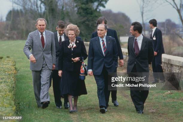 In the foreground, from left to right: Michel d'Ornano, then president of the general council; Margaret Thatcher; François Mitterrand; Jacques...