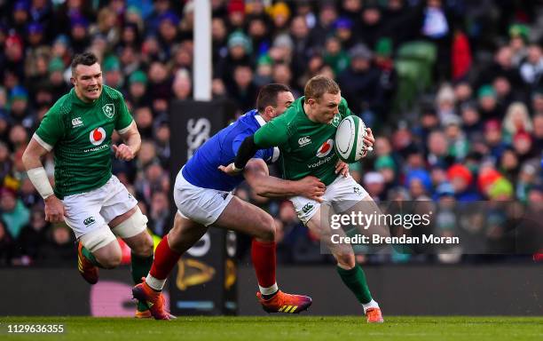 Dublin , Ireland - 10 March 2019; Keith Earls of Ireland is tackled by Louis Picamoles of France during the Guinness Six Nations Rugby Championship...