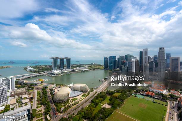 aerial view of singapore business district and city in singapore, asia. - singapore city aerial stock pictures, royalty-free photos & images