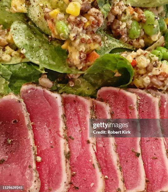 seared tuna with a variety of vegetables - newark stock pictures, royalty-free photos & images