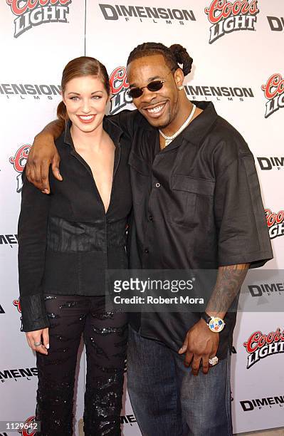 Actress Bianca Kajlich and rapper Busta Rhymes attend the premiere of "Halloween: Resurrection" at the Mann Festival Theater on July 1, 2002 in...