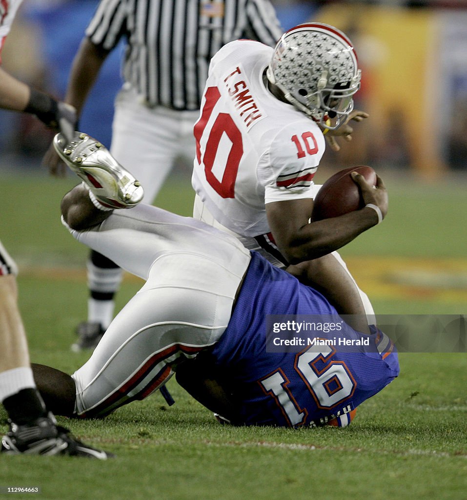 Florida's Derrick Harvey sacks Ohio State quarterback Troy S