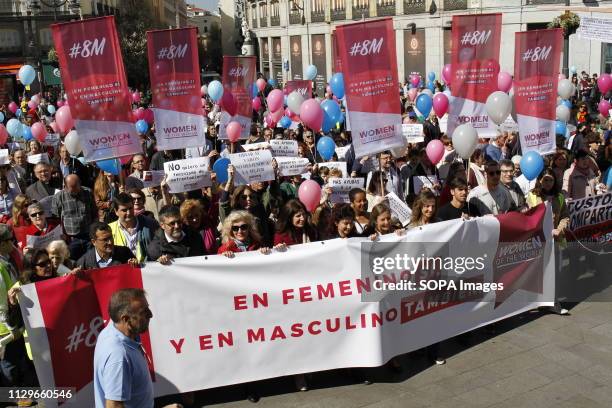 Protesters are seen holding a banner, balloons and placards during the protest. Women of the world and other platforms organised a feminist Protest...