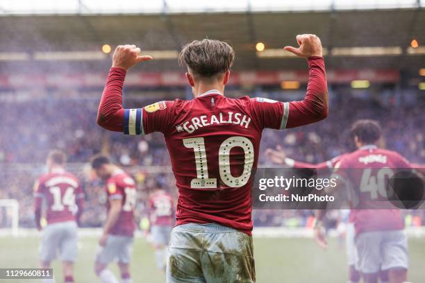 Jack Grealish of Aston Villa celebrates after scoring his team's winning goal during the Sky Bet Championship match between Birmingham City and Aston...